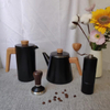 Tetera de 1,2 L resistente al calor de acero inoxidable de doble pared con mango de madera y infusor