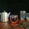 Tetera de 1,2 L resistente al calor de acero inoxidable de doble pared con mango de madera y infusor