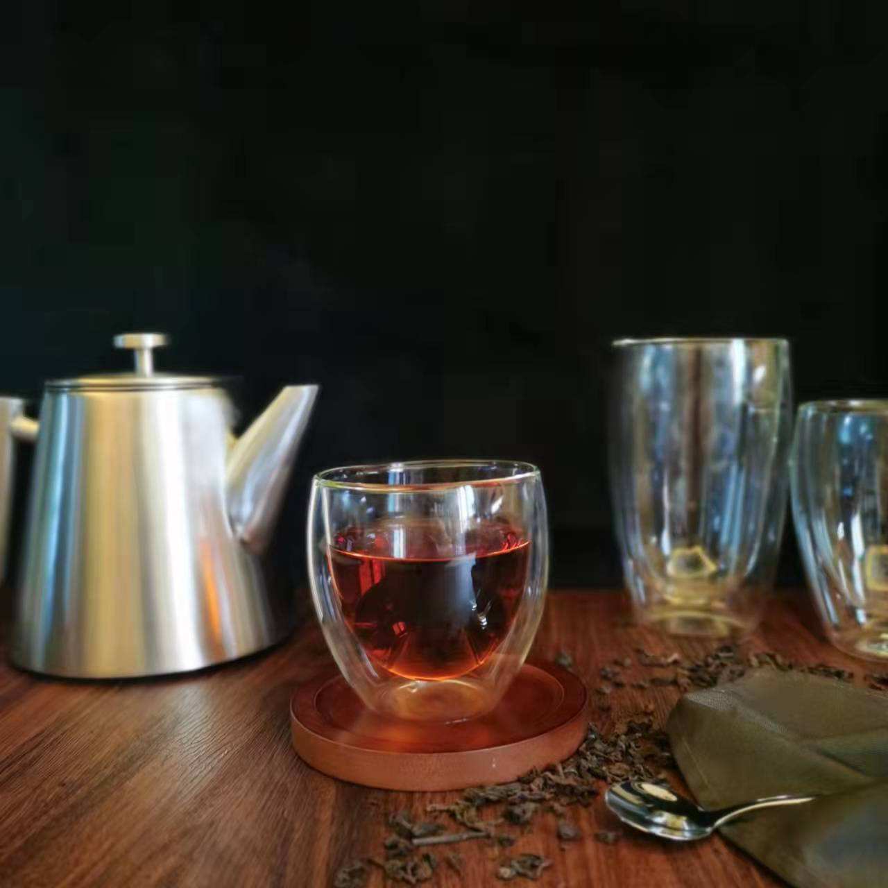 Tetera de 1,2 L resistente al calor de acero inoxidable de doble pared con mango de madera y infusor