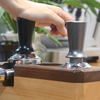 Manipulación de café espresso Presión calibrada Antiadherente Autonivelación Mango refinado Manipulación de café de acero inoxidable